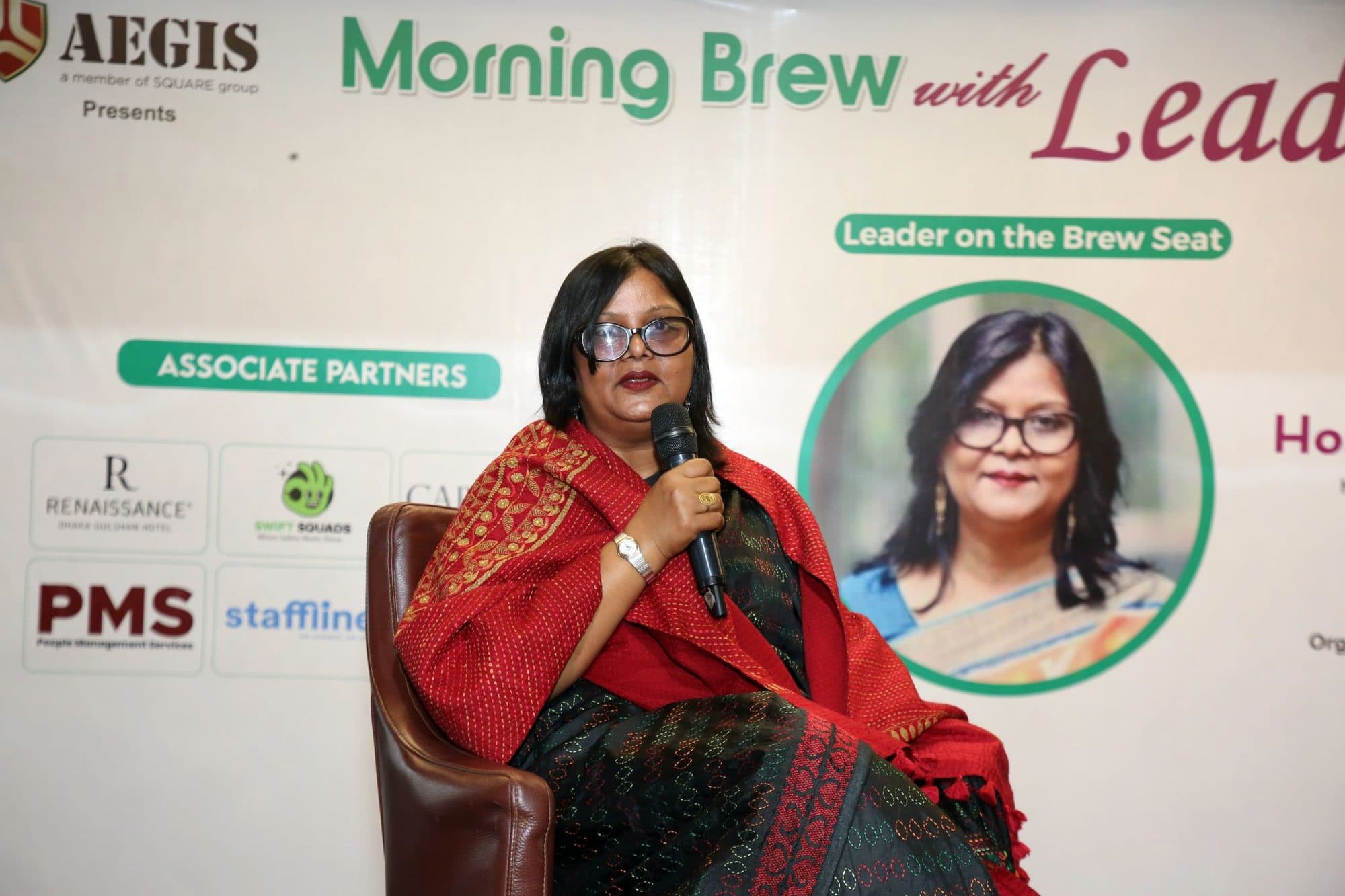 The guest leader speaks from the Morning Brew with Leaders stage